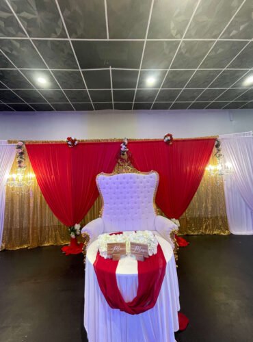 Royal Palace Akron banquet hall with decorated tables and chairs for a private event