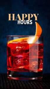 Happy hour cocktail served at a cocktail bar in Akron Ohio with ice and orange peel garnish.