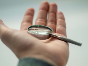 Magnifying glass symbolizing what to look for in bridal shower venues near you